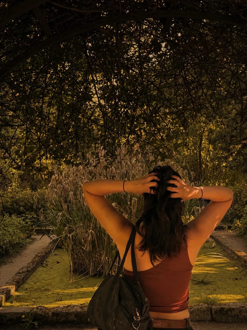 Portrait of La Fahrenheit in warm Mediterranean garden light